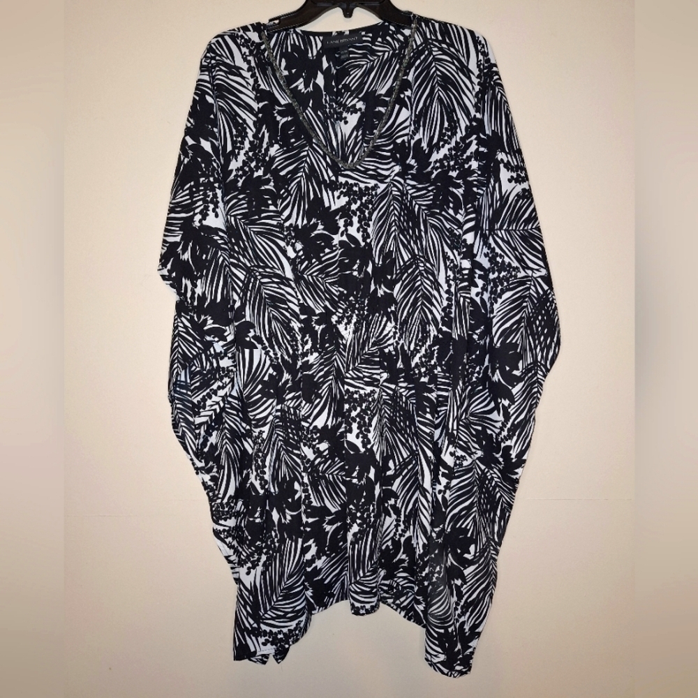 A Lane Bryant semi-sheer beach cover-up in a size 22/24. It's in EUC.
